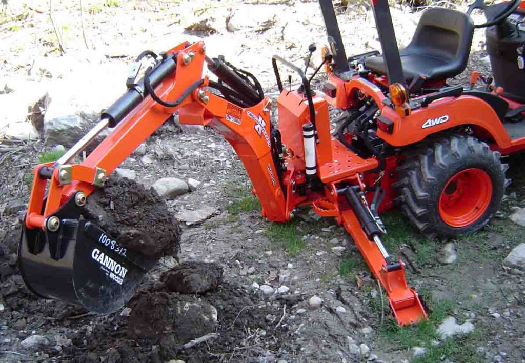 kubota excavator digging BX1500 Woods BH6000