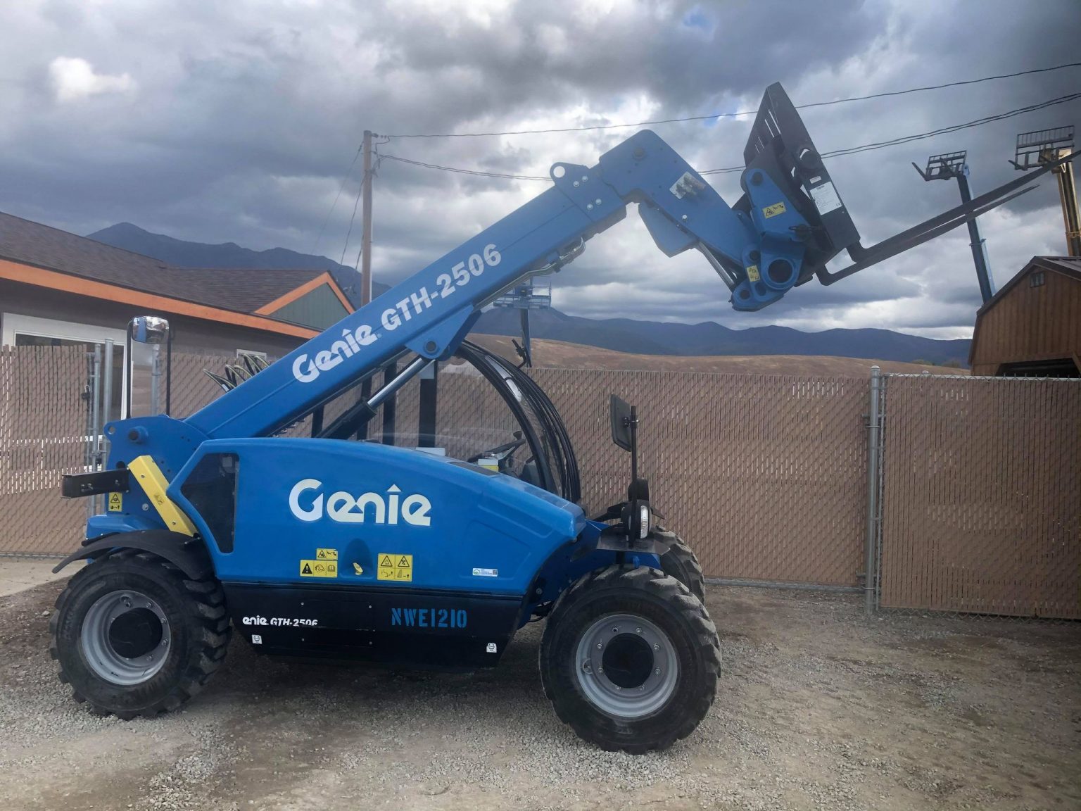 19’ Genie GTH-2506 Compact Telehandler Enclosed Cab - North 93 Rentals